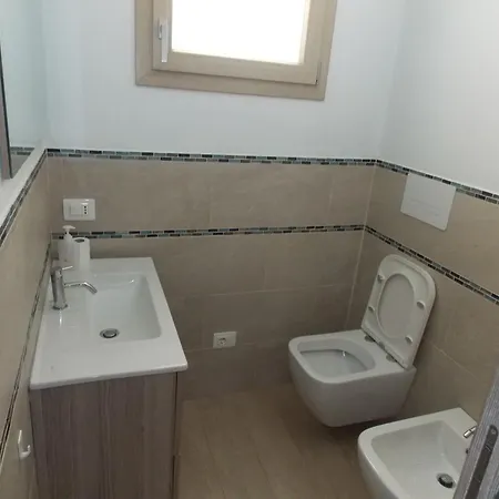 Sardinia Seafront House Апартаменти